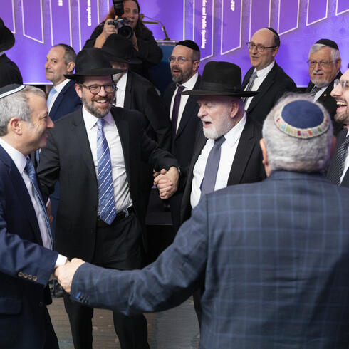 "Rosh Yeshiva Ari Berman (first from left) and Hershel Schachter (third from left) celebrate newly appointed Deans Rabbi Aryeh Lebowitz (second from left) and Rabbi Dr. Yosef Kalinsky (fourth from left)."